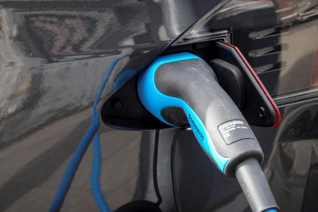 A car charges safely at home.