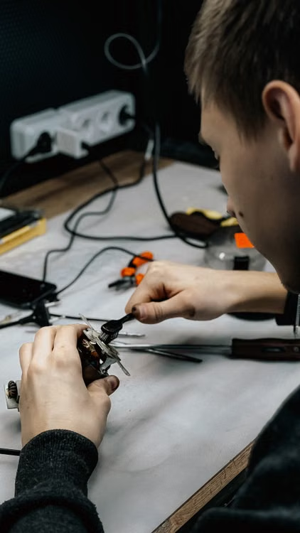 An electrician proofs wiring components.